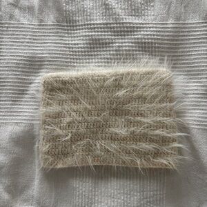 UO Cream Fuzzy Knit Hat